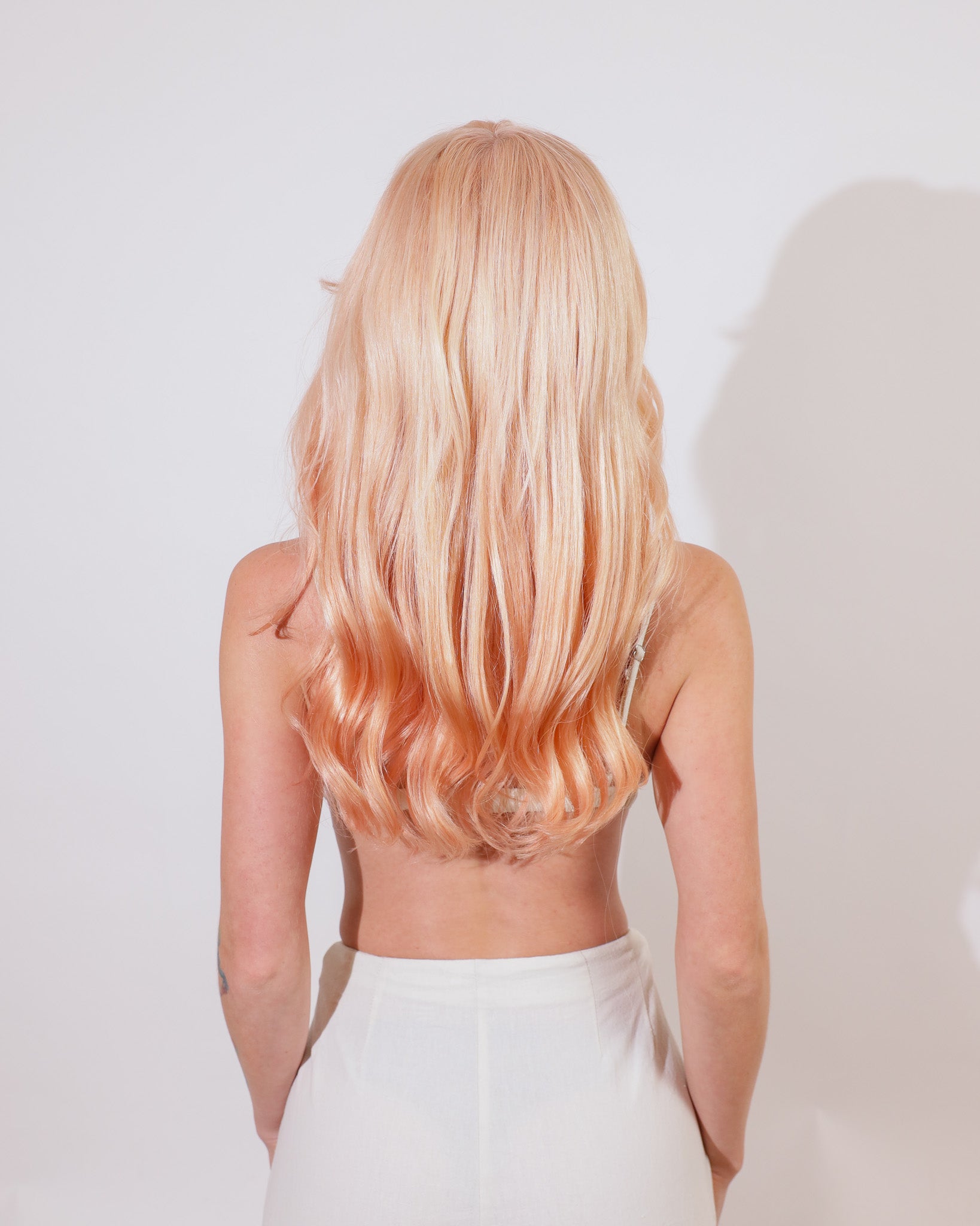 PEACH PRALINE LAYERED HUMAN HAIR WIG